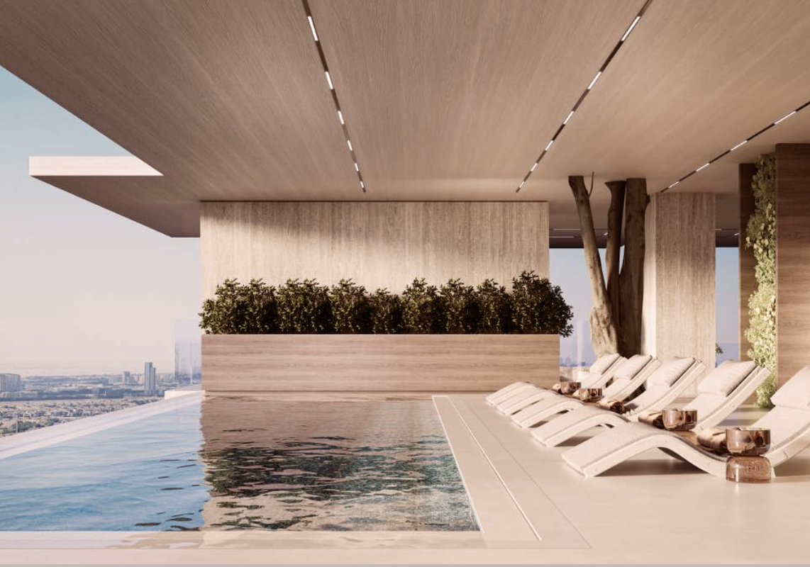 Pool with lounge chairs in Treppan Tower