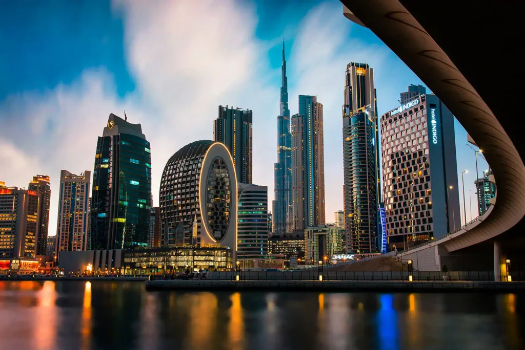 Downtown Dubai and Business Bay skyline at dusk with the Burj Khalifa